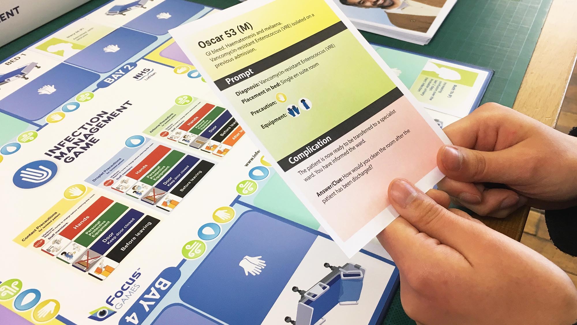 A close up of one of the Infection Management Game question cards.