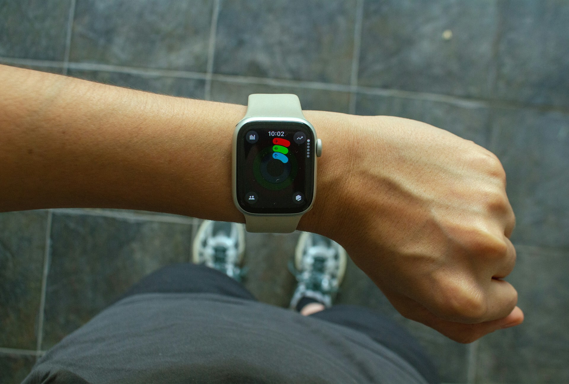 A person looking at their smartwatch screen.